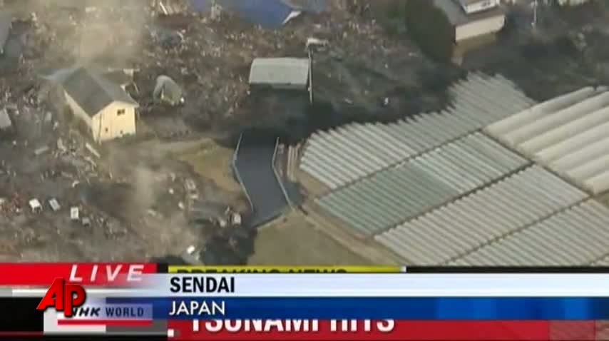 Tsunami Slams Northeast Japan