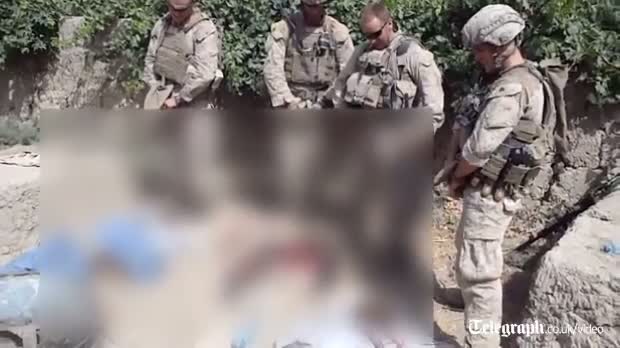 US military investigate video in which marines urinate of dead bodies of Taliban fighters