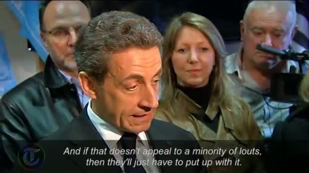Nicolas Sarkozy penned into bar after being heckled on France presidential election campaign