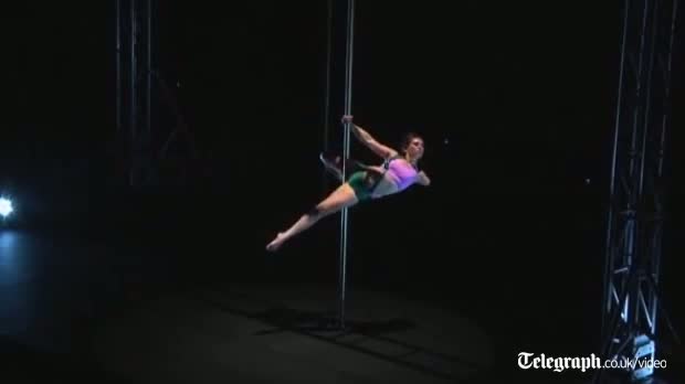 One armed pole dancer takes world title video