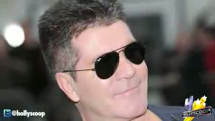 Woman Breaks Into Simon Cowell's House with Brick video