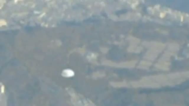 UFO Caught From Airplane - Seoul, South Korea - April 07, 2012