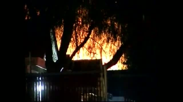 Raw Video - Flames Seen Near Calif. Standoff