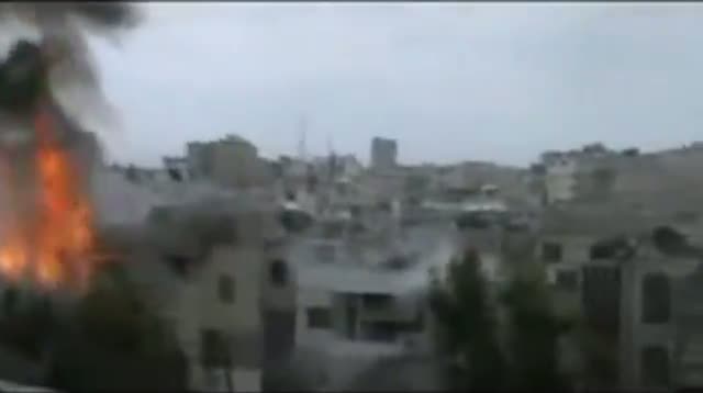 Raw Video - Syrian Troops Continue Homs Shelling