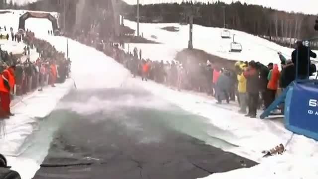 Daredevils try to ski over ice cold puddle in Russia
