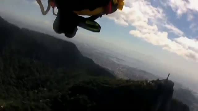 Yves 'Jetman' Rossy flies over Rio de Janeiro
