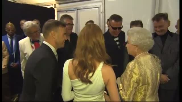 The Queen jokes with JLS about her TV dinners backstage at the Diamond Jubilee concert