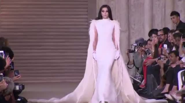 Kim Kardashian Takes in Paris Fashion Show