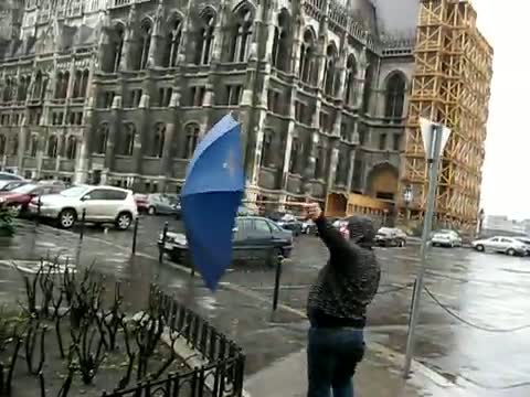 Crazy Man Singing in the Rain in Budapest Video