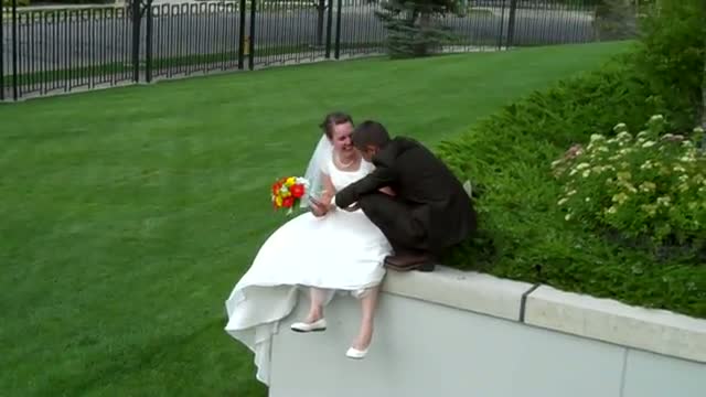 Bride and Groom fall in bushes! Too funny!