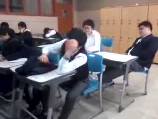 Hilarious slapping prank on sleeping student