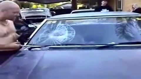 Aussie guy headbutts windshield