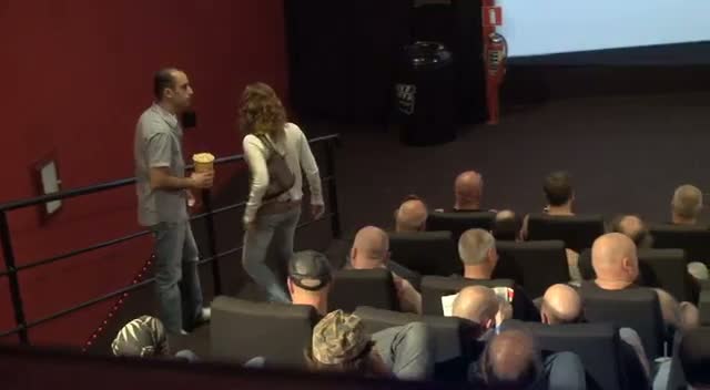 Theater full of bikers, two open seats