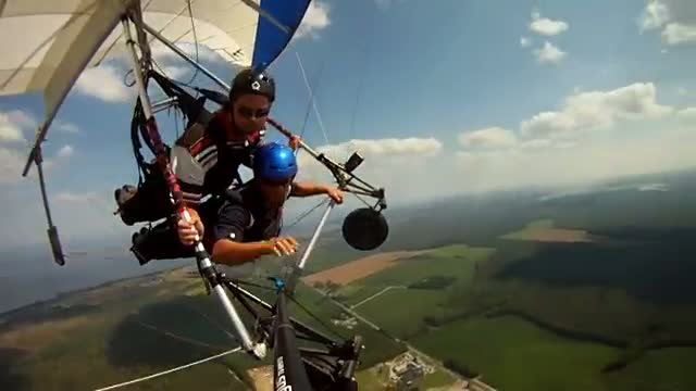 Guy throws up while hang gliding at 2,000 feet