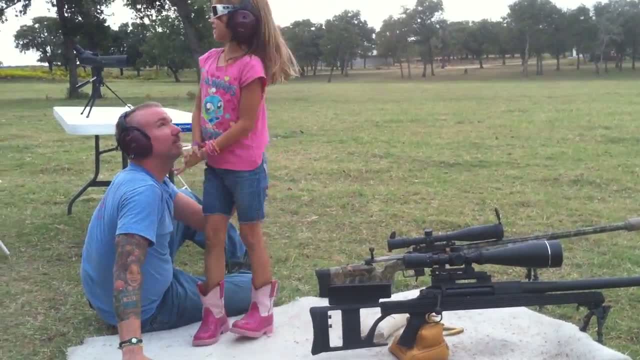 8 year old girl shoots 50 cal.