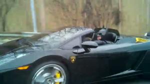 Batman cruising in his Lambo