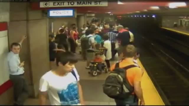 Raw Video - Woman, Son Rescued From Subway Tracks