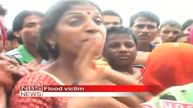 Police manhandles flood victims