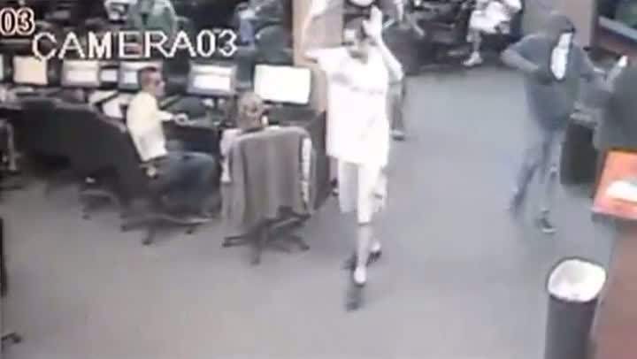 Customer At Internet Cafe Shoots 2 Robbers