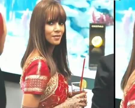 Click Dusky sensation Halle Berry dons red sari