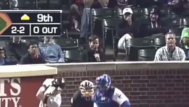 Fan making inappropriate gestures at baseball game
