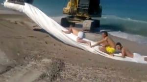 Having Fun at The Beach With Excavator