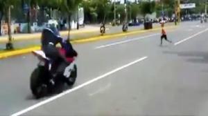 Kid Narrowly Avoids Death By Motorcycle
