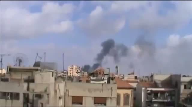 Raw - Activists Say Syrian Warplanes Pound Homs