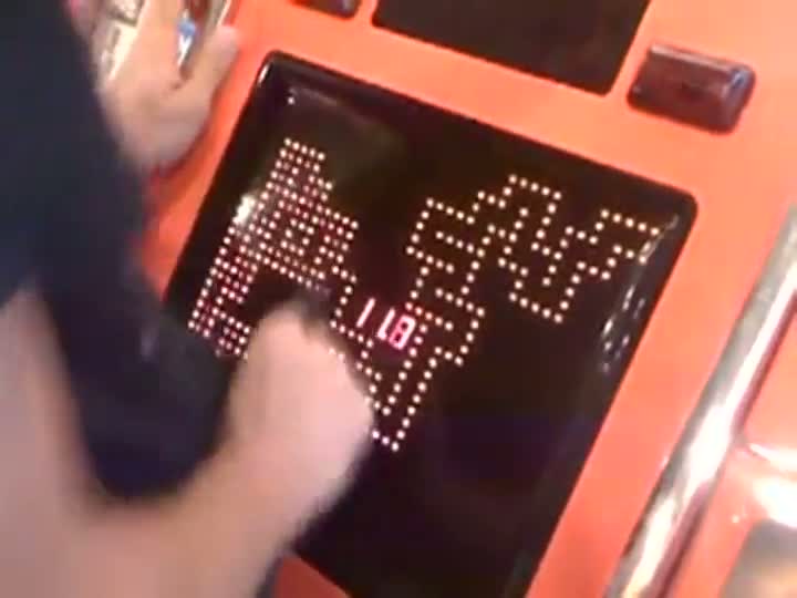 Kid Owns Flamin Finger Arcade Game