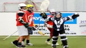 7th Grade Lacrosse Goalie Lays Out a Player