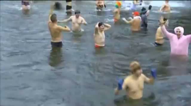 Raw: Polish Swimmers Brave Icy Waters