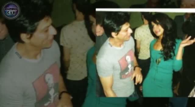 Priyanka Chopra CAUGHT putting her hands in Shah Rukh's clothes