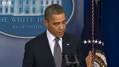 Wiping away tears, Obama mourns children killed in school shooting