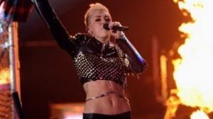 Miley Cyrus Flaunts Her Abs