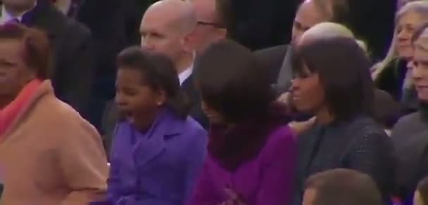 Sasha Obama yawns during her father's inauguration speech