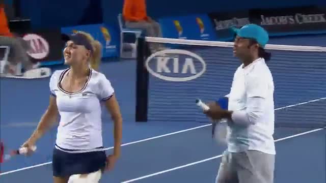 Australian Open 2013 - Elena Vesnina Hits Leander Paes