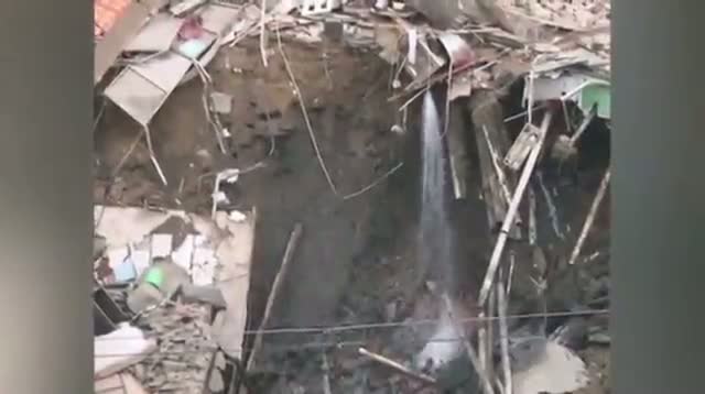 Giant Sinkhole Gobbles Up Building in China