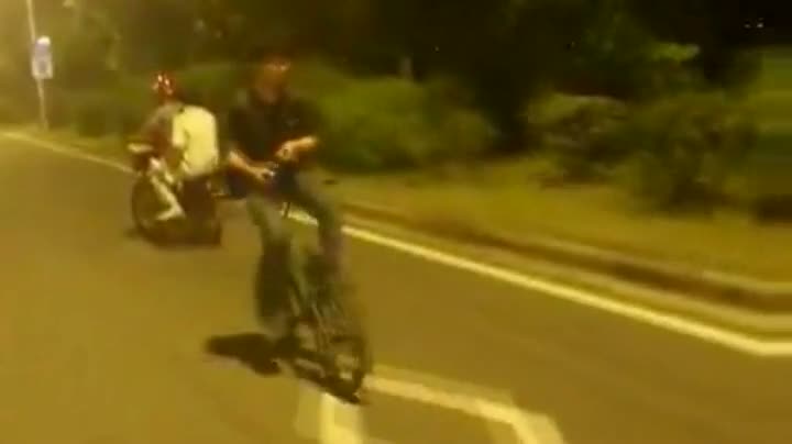 Riding A Bicycle Backwards While Texting