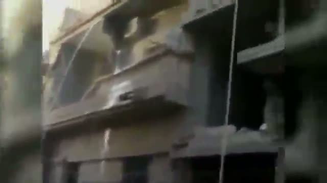 Shells Fall in Homs, Syria, People Scramble