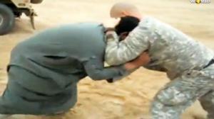 Iraqi Tosses U.S. Soldier