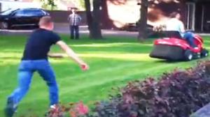 Guy Gets Owned Mowing the Lawn