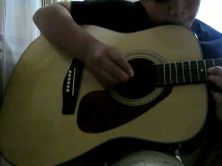 Kid Plays Guitar While Mom Has $ex in the Background