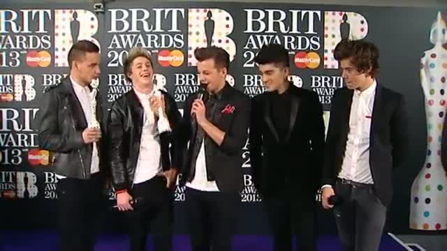 Brit Awards: One Direction celebrate Global Success Award in the winner's room