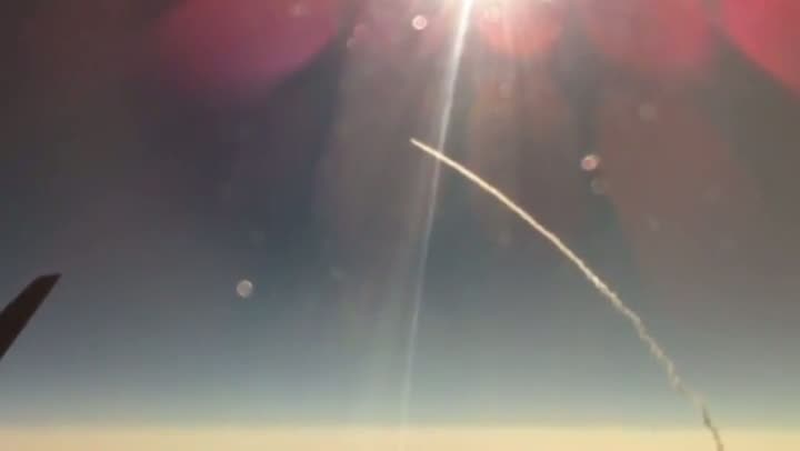 Endeavour's Final Launch from Airplane Window