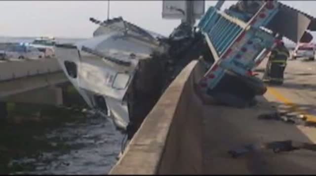 Driver Rescued From Dangling Truck on Va. Bridge