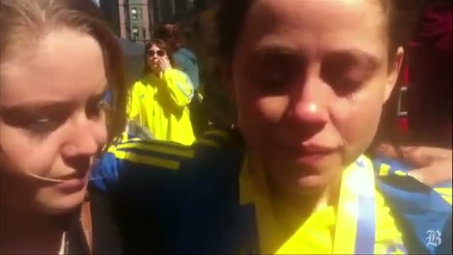 Boston marathon runners emotional while picking up their bags