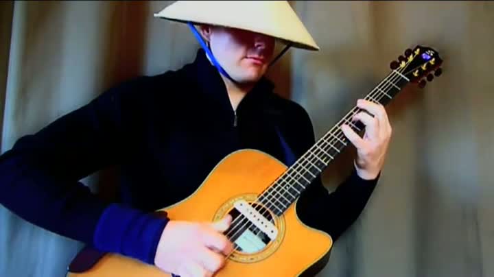 Guy Plays Trance Music On Guitar