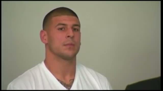 Hernandez Charged With Murder, Cut by Patriots