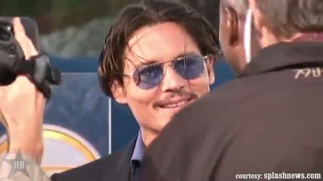 Johnny Depp Kisses Jimmy Kimmel On His Lips