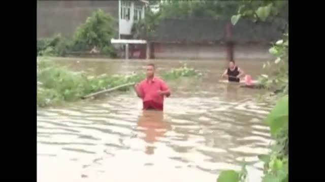 Flooding, Landslides Bury Dozens in China
